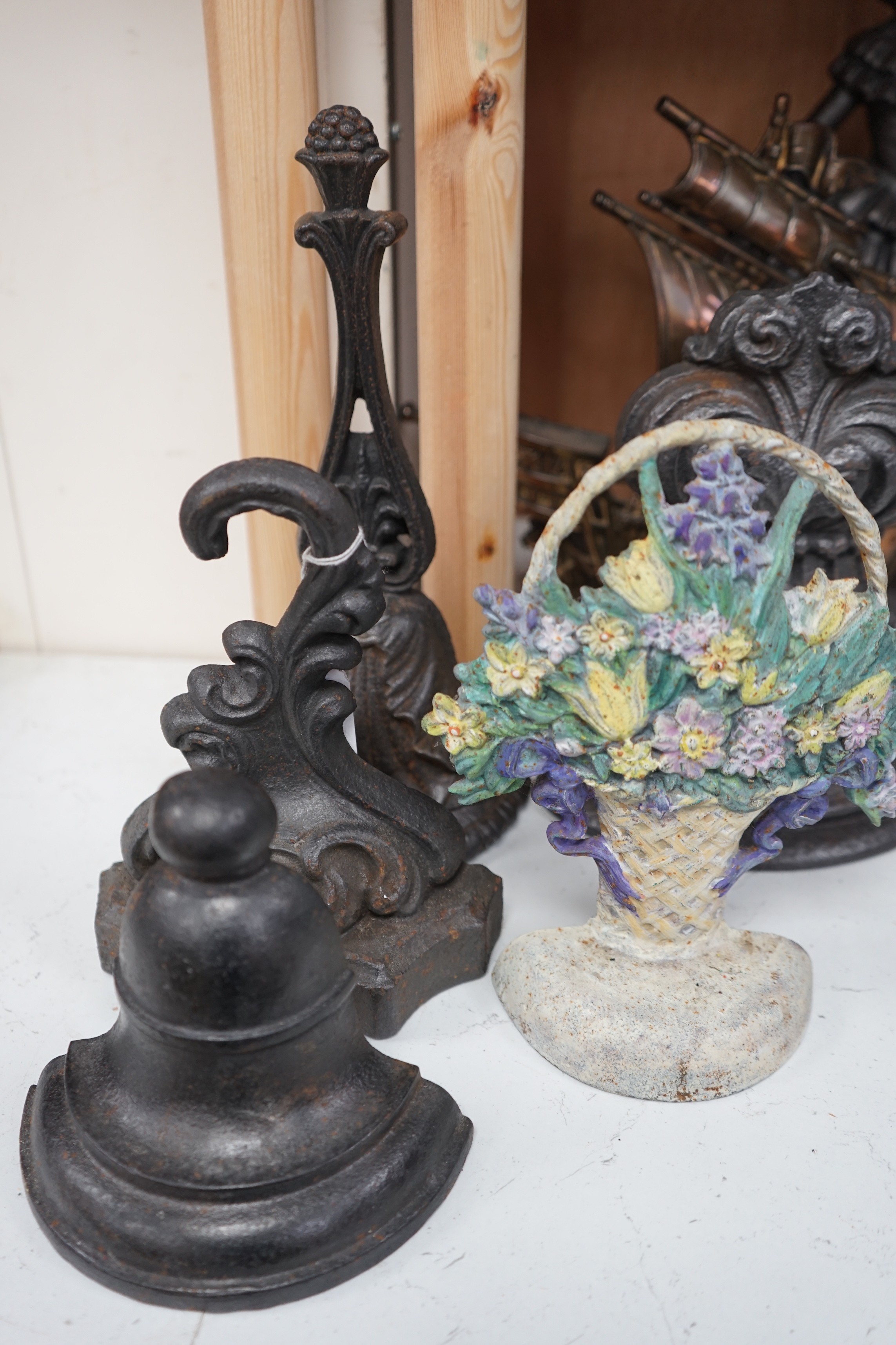 Seven assorted cast iron doorstops, tallest 38cms high